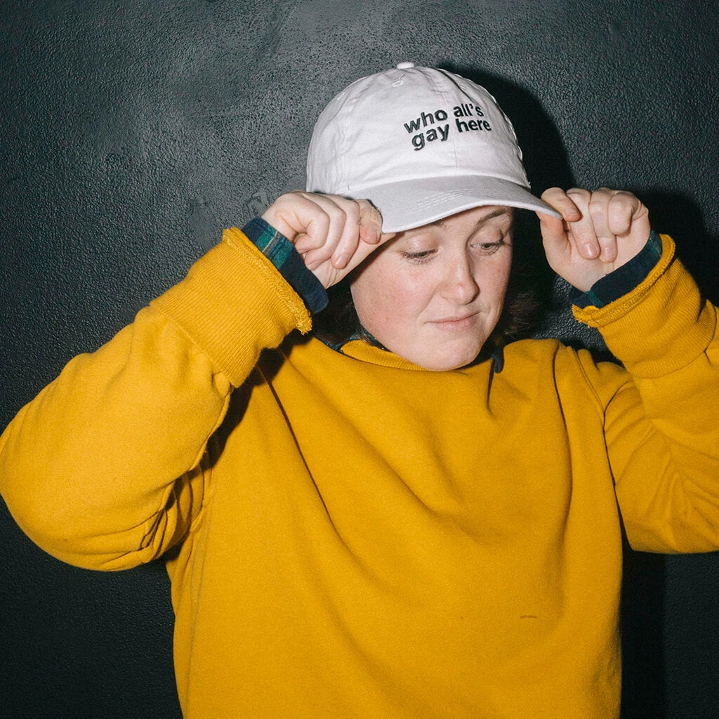 Autostraddle New Merch Who All's Gay Here Hat 2 Autostraddle New Merch Who All's Gay Here Hat